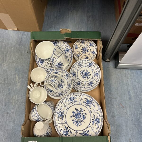 Vintage Johnson Bros Indies dinner service set with floral pattern.