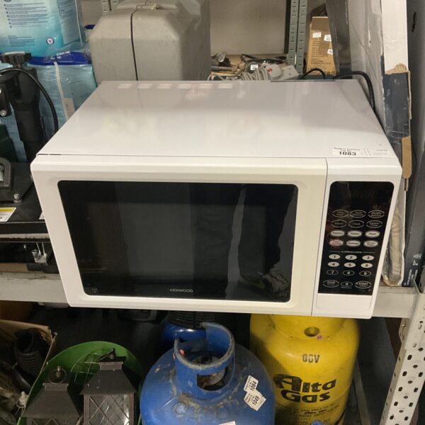 White Kenwood microwave oven with digital control panel.