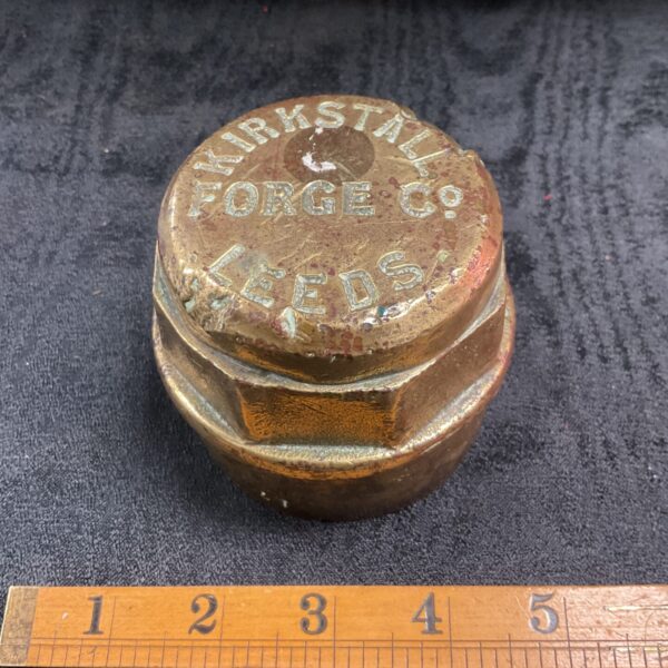 Vintage brass Kirkstall Forge hub cap from Leeds.