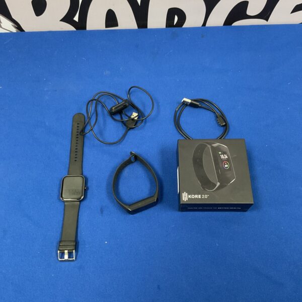 Black Kore 2.0 fitness watch with charging cable.