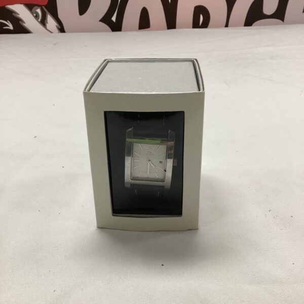 Silver Lacoste wristwatch presented in its original box.