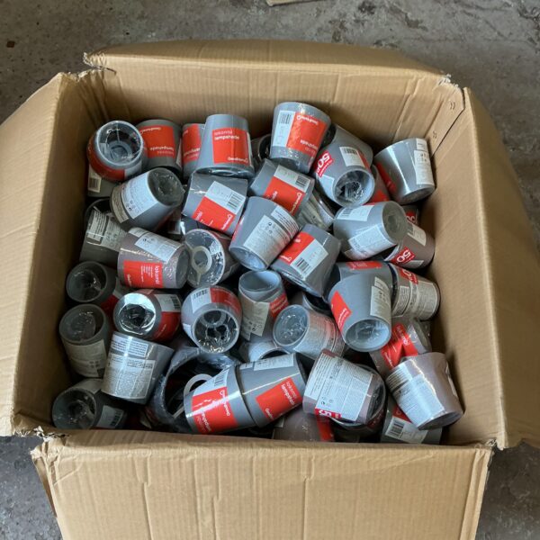 Box of small lamp shades for lighting and home decor.