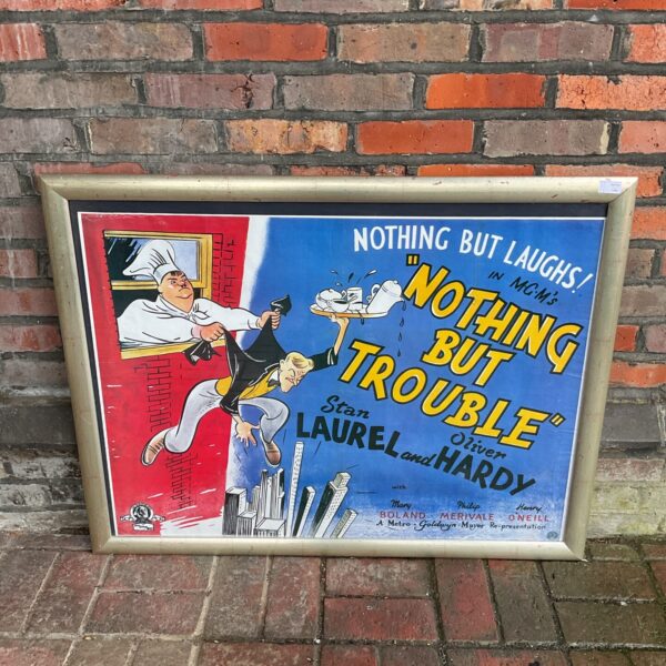 Vintage Laurel and Hardy "Nothing But Trouble" movie poster.
