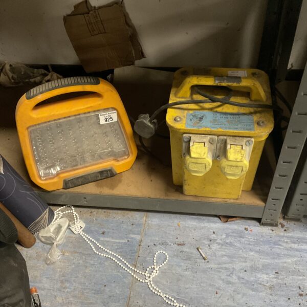 Portable led site light with 110v transformer for construction.