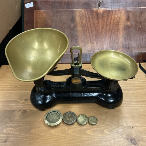 Antique Libra balance scales, cast iron weighing equipment.
