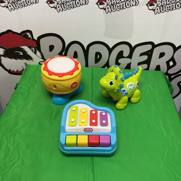 Colourful Little Tikes piano, a learning toy for toddlers.