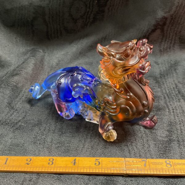 Vibrant multi-coloured Liuli Pixiu Feng Shui figure for wealth attraction.