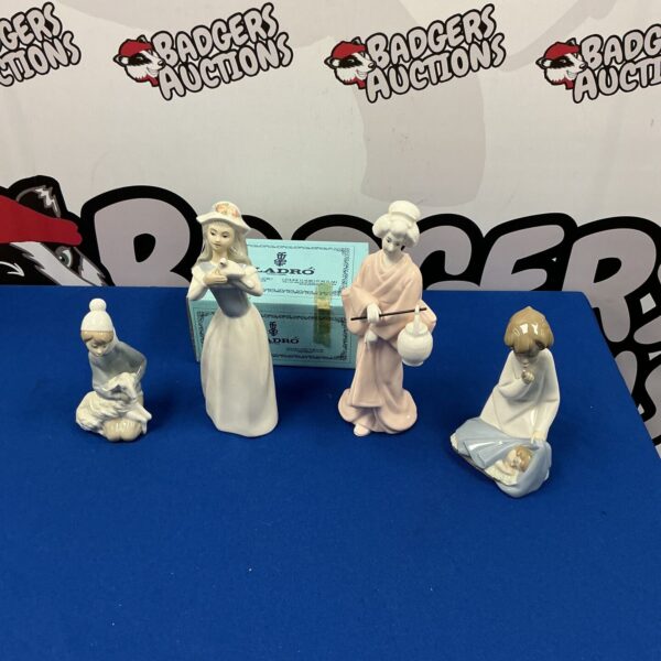 Delicate Lladro porcelain figurine with intricate detailing.