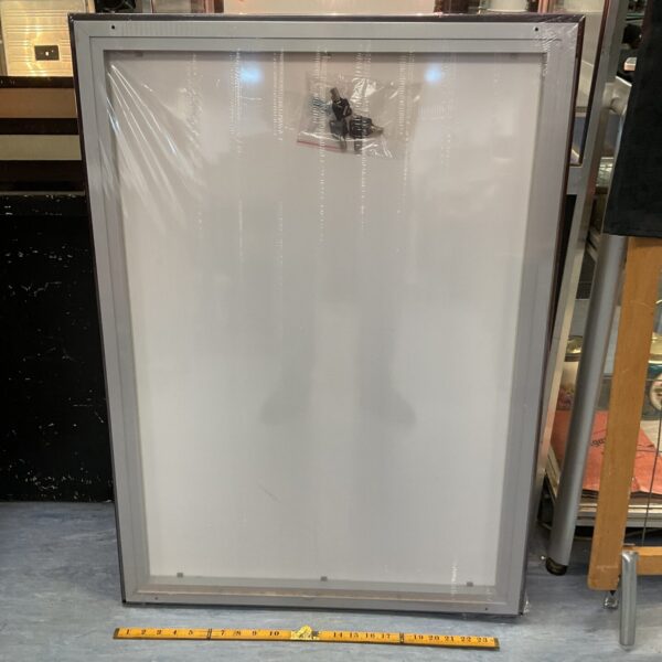 Front view of a lockable notice board with a secure frame.