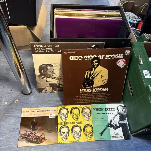 Vintage Louis Jordan records lot, featuring jump blues and R&B vinyl.