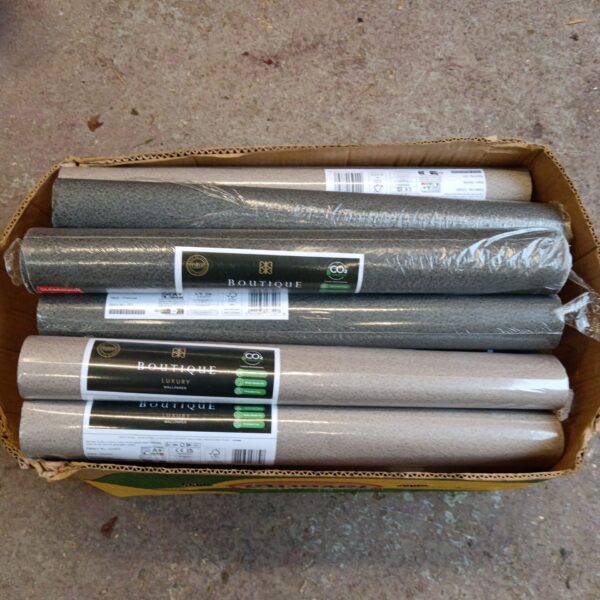 Boxed luxury wallpaper rolls for home decor and interior design projects.