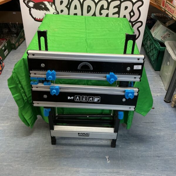Front view of a used Mac Allister metal work bench.