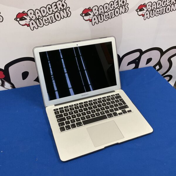 Blue Macbook Air laptop, model 1466, for sale.