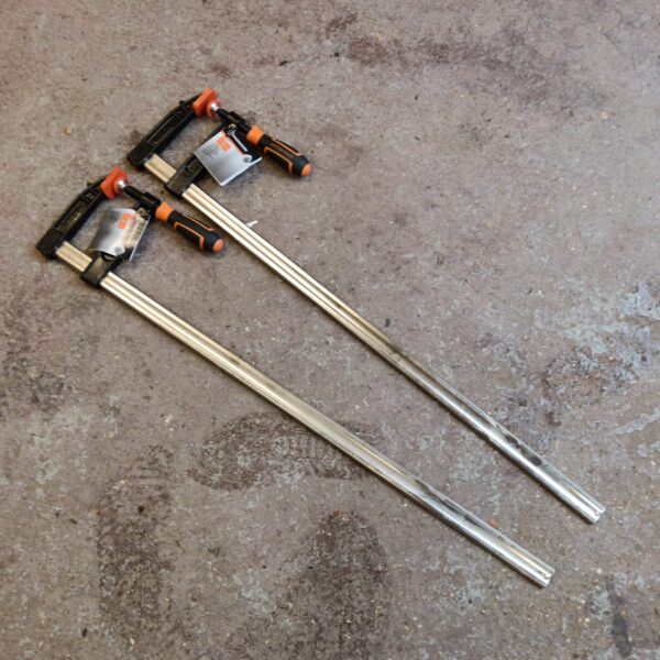 Pair of new Magnusson F clamps for woodworking projects.