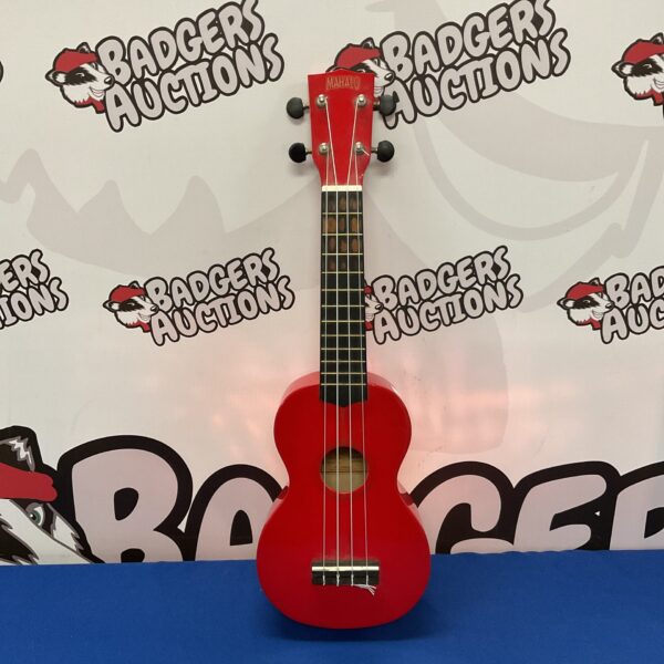 Red Mahalo MR1D soprano ukulele, a beginner-friendly musical instrument.
