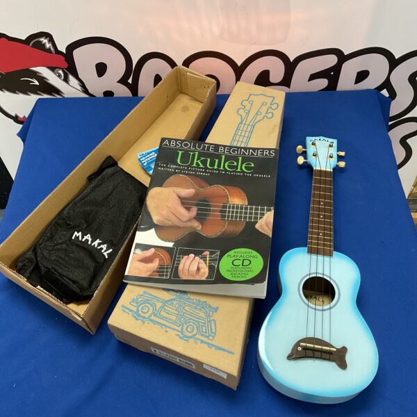 Makala ukulele set with case and beginner’s instruction book.