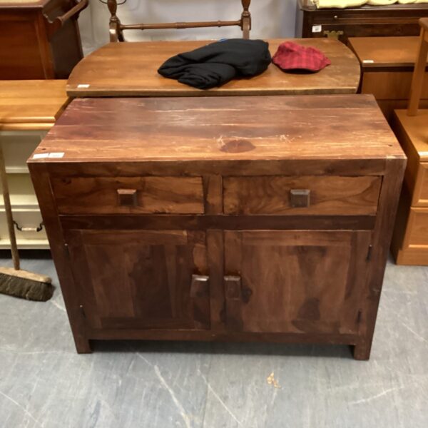 Rustic mango wood sideboard with two drawers and doors.