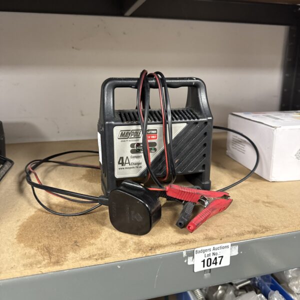 Compact Maple 4 amp battery charger for automotive use.