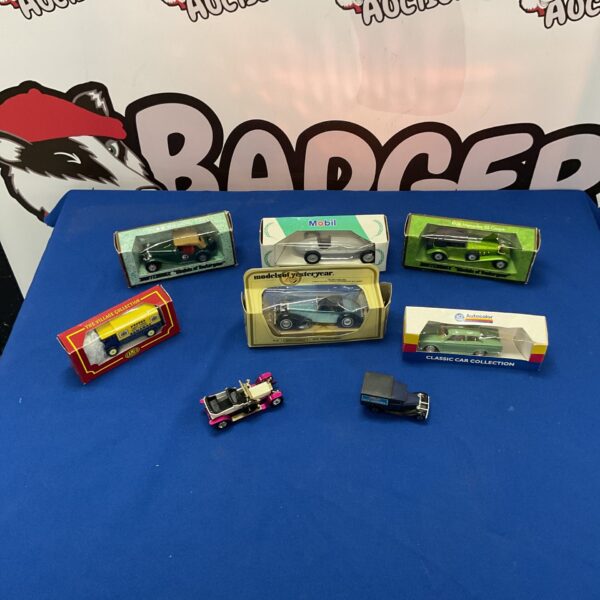 Vintage lot of Matchbox and Corgi diecast cars, including Mercedes Benz models.
