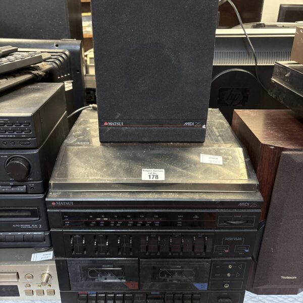 Vintage Matsui MIDI 25 stereo system with cassette player.