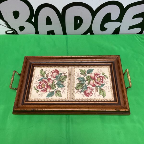 Antique Maw serving tray with floral tiles and oak frame.