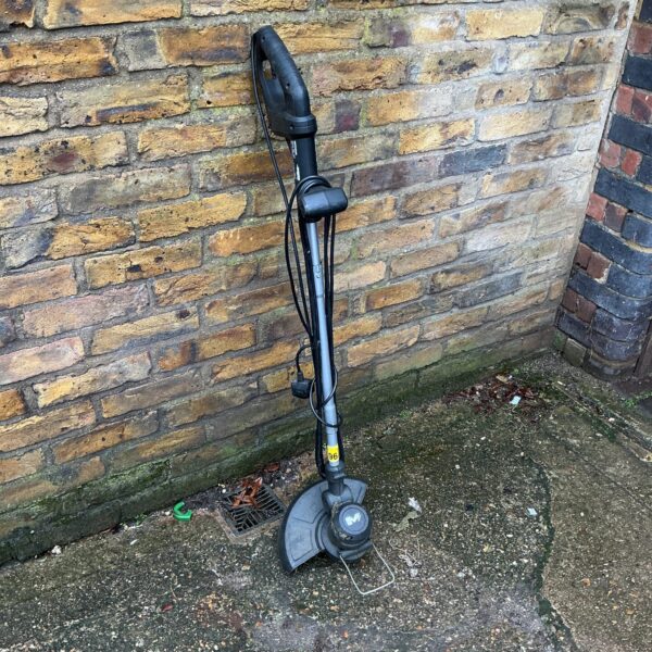 Mcaalister electric garden strimmer for lawn maintenance.
