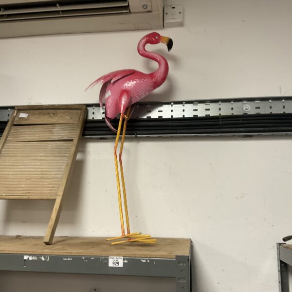 Vintage metal garden flamingo ornament for lawn decoration.