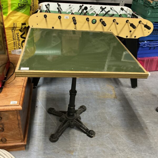 Vintage metal square table with industrial base.