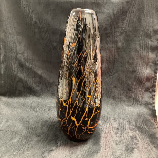 Vintage Micasa Desert Dance vase with orange and brown swirl design.