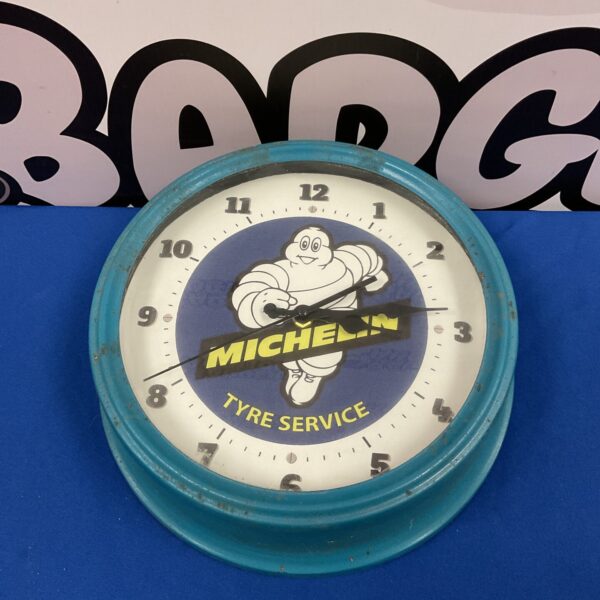 Vintage Michelin tyre clock with the Michelin Man logo.