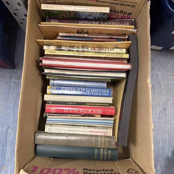 Vintage mixed book lot with dictionaries and reference books.