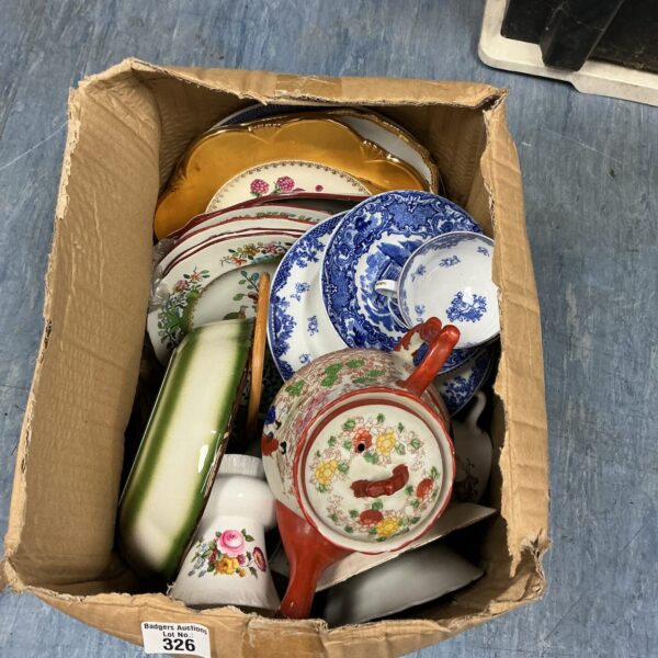 Mixed china lot with vintage tea pots and serving dishes.