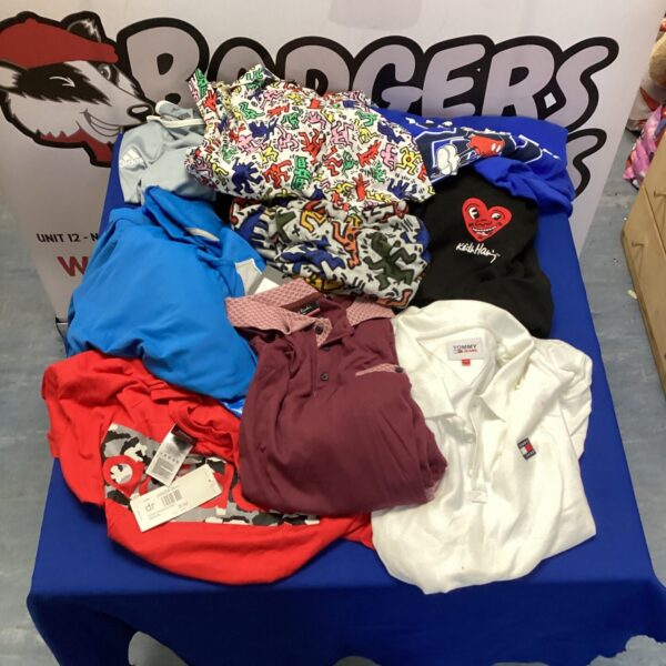 Mixed clothing lot with breakdancer and Mickey Mouse shirts.