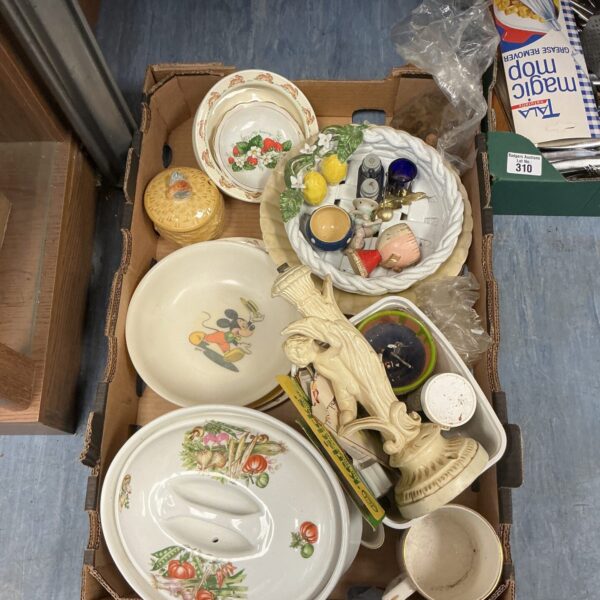 Mixed collectibles lot featuring a Mickey Mouse plate and vintage figurines.