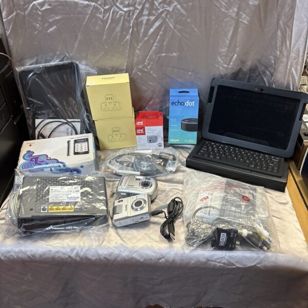 Mixed electrical lot with cables, adapters, and Amazon Echo Dot.