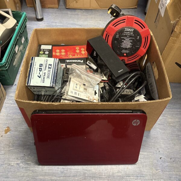 Mixed electrical lot with HP laptop, Sony speakers and Panasonic phone.