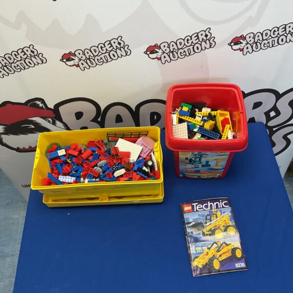 Assorted mixed Lego bricks in two boxes, colourful building blocks.