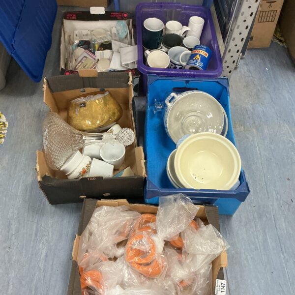 Mixed lot of assorted items in storage boxes.