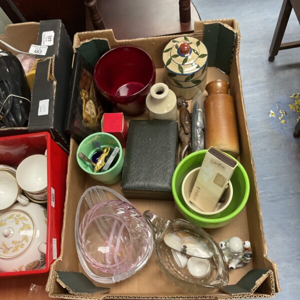 Mixed lot of vintage ceramics and glassware on display.