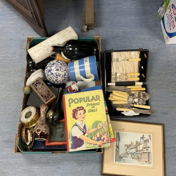 Mixed lot of vintage collectibles including cutlery and a book.