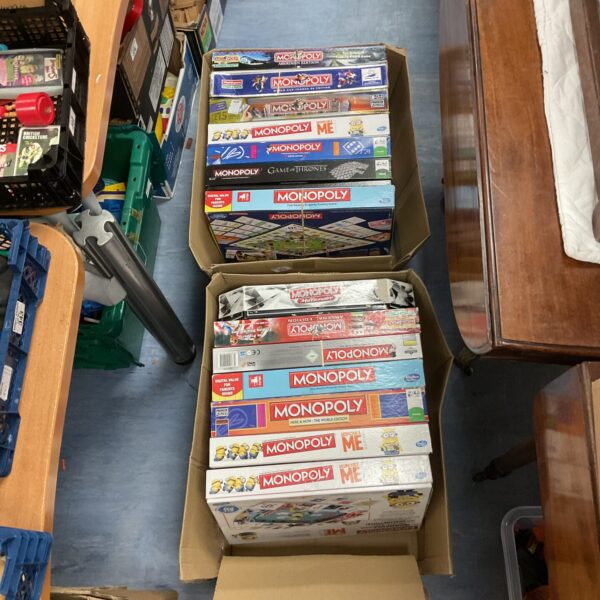 Lot of fourteen Monopoly board games including themed editions.