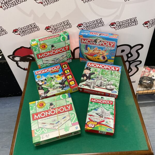 Lot of six Monopoly board games including Junior and Grab and Go.