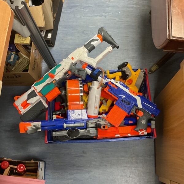 Assortment of Nerf guns in a lot for sale.