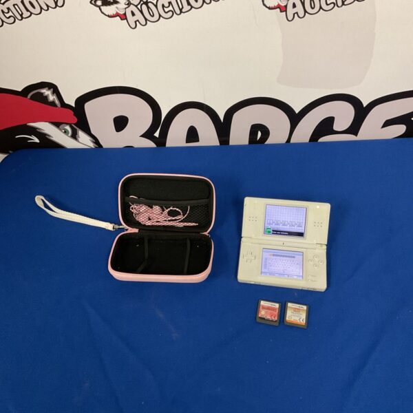Nintendo DS console with game case and cartridges.