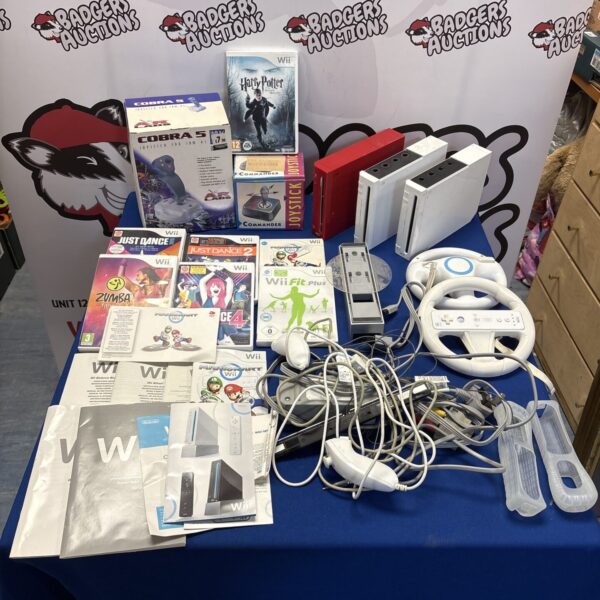 Nintendo Wii console bundle with games and accessories.
