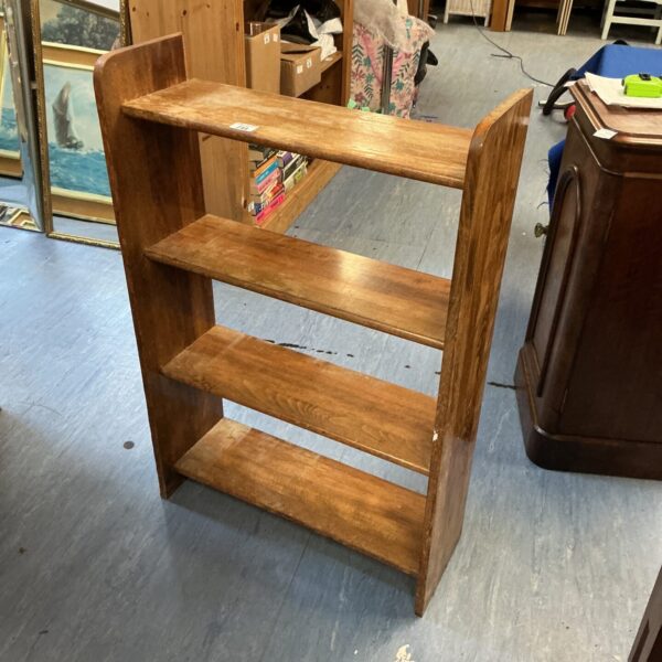 Vintage oak bookcase with three tiers of storage.