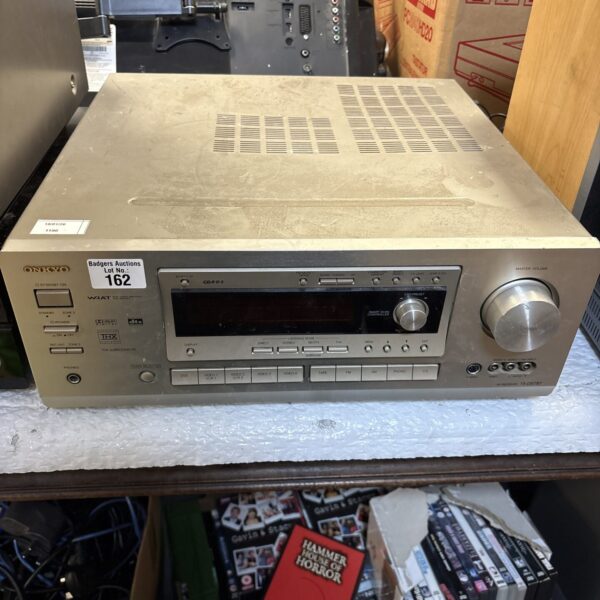 Black Onkyo TX-DS787 AV receiver for home cinema setup.