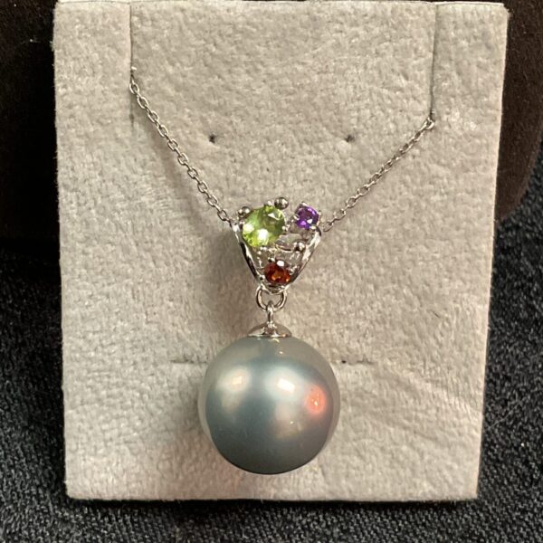Pandora silver necklace with colourful stone pendant on a silver chain.