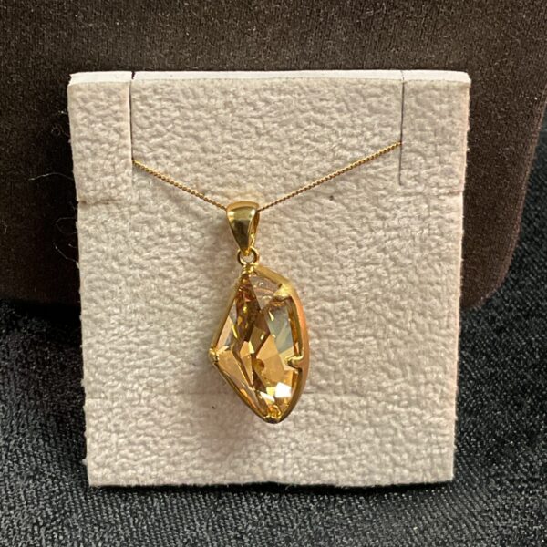 Pandora silver necklace with vibrant yellow stone pendant.