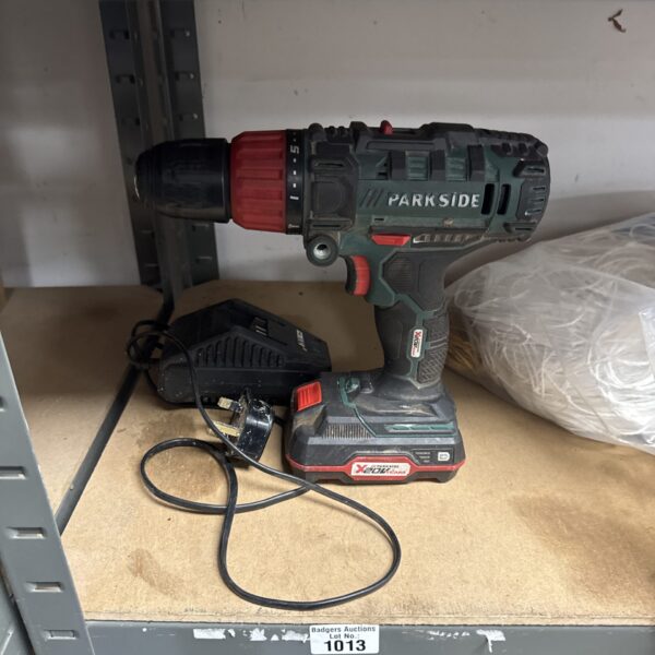 Parkside cordless drill set with battery and charger.